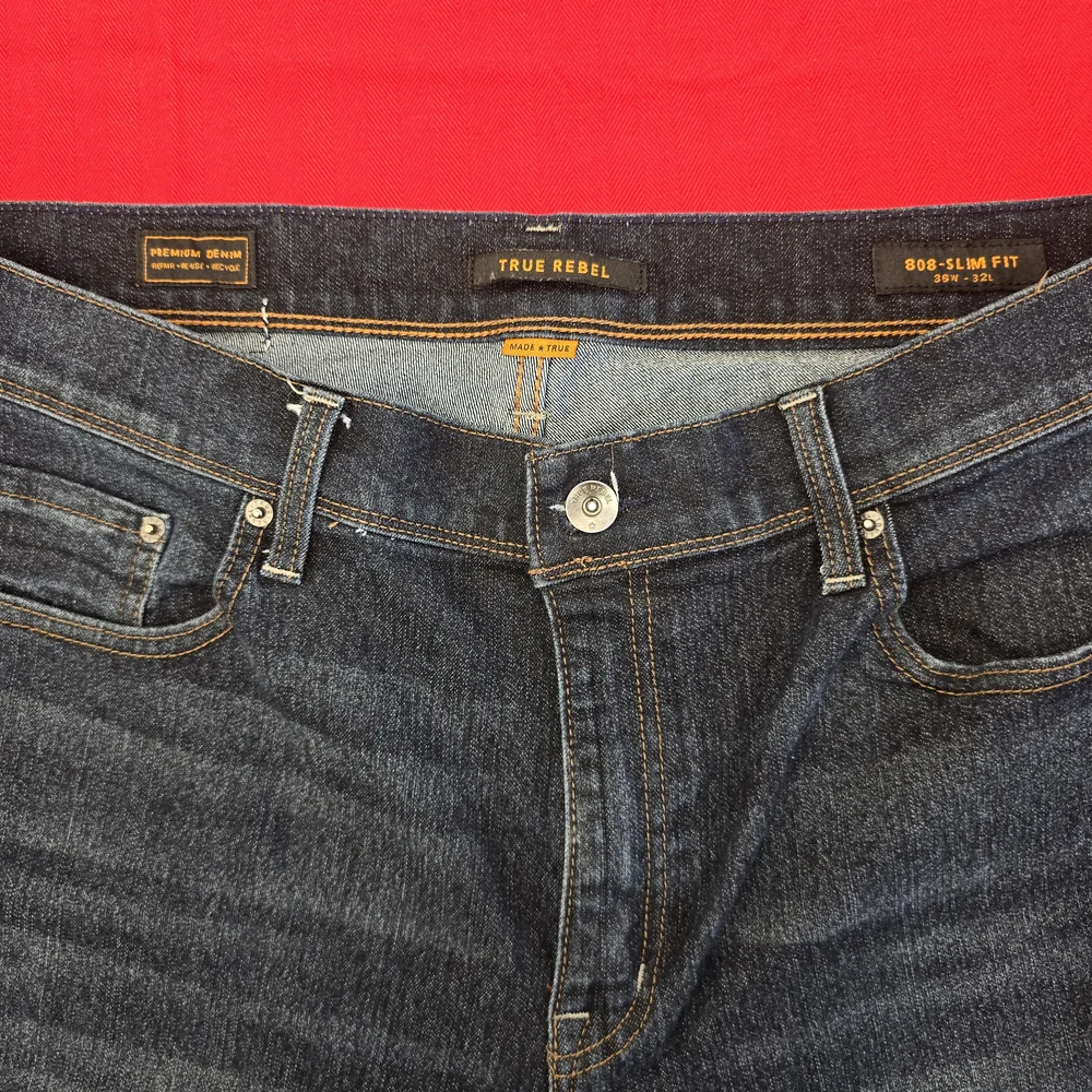 True Religion Black Jeans with Signature Pocket Stitching